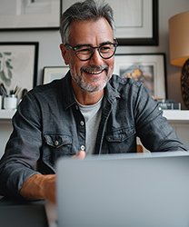 Wesmcdowell Happy Middle Aged Man Looking At His Laptop In Nice F56f1a6b 9518 42d8 A75f Dcffb8ca291d 1